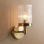 1-Light Wall Mounted Lamp Traditional Cylinder Transparent Glass Sconce Light in Brown/Gold over Bed