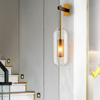 Postmodern Capsule Wall Hanging Light Clear Glass 1 Bulb Bedside Wall Mounted Lamp with Interior Mesh Guard in Black/Gold