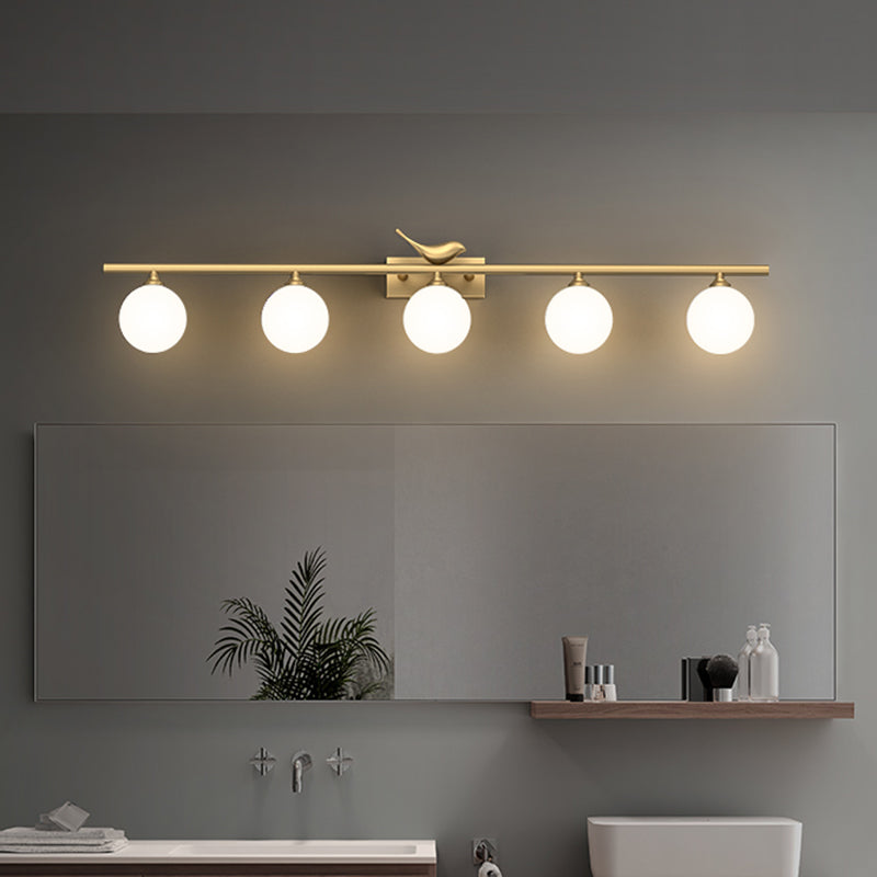 Ball Bathroom Vanity Sconce Opal Glass Postmodern Wall Light with Bird Decor in Brass