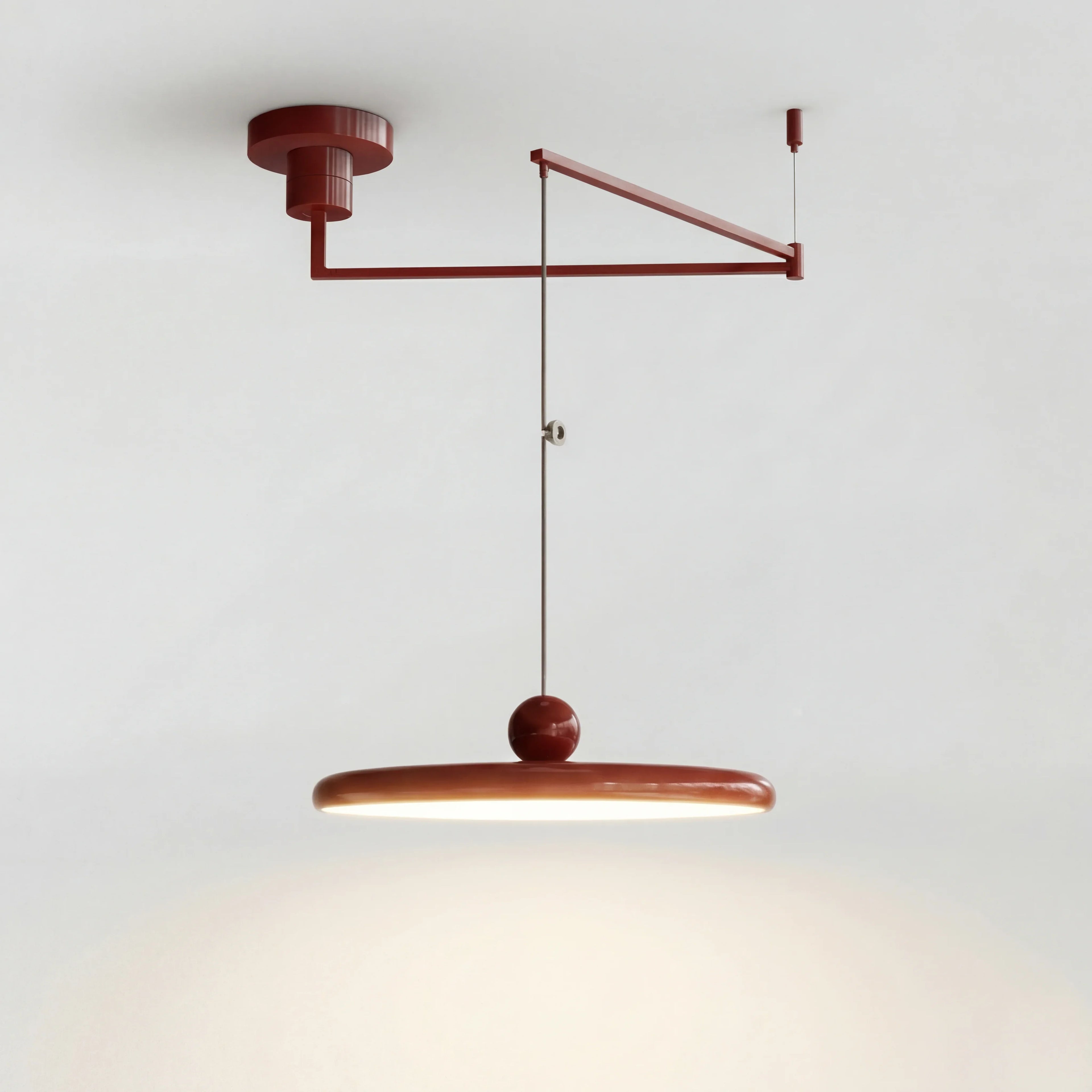 Orion Adjustable Swing Arm Acrylic Disc Pendant Light