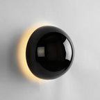 Modern LED wall sconce in the shape of a shimmering ball – wall lighting with a Bauhaus halo effect