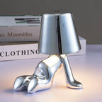 Designer LED Table Lamp Sitting Man with Glossy Finish