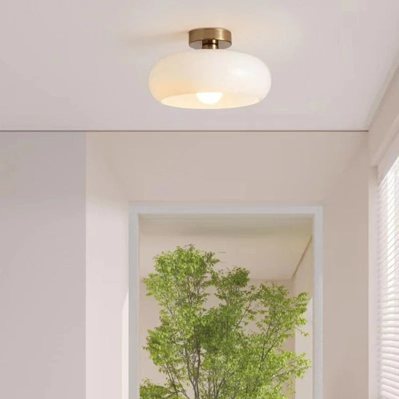 Hanging lamp with an opalescent shade – an elegant retro Bauhaus accent