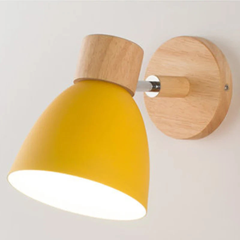 Modern wall lamp with a wooden base and metal shade