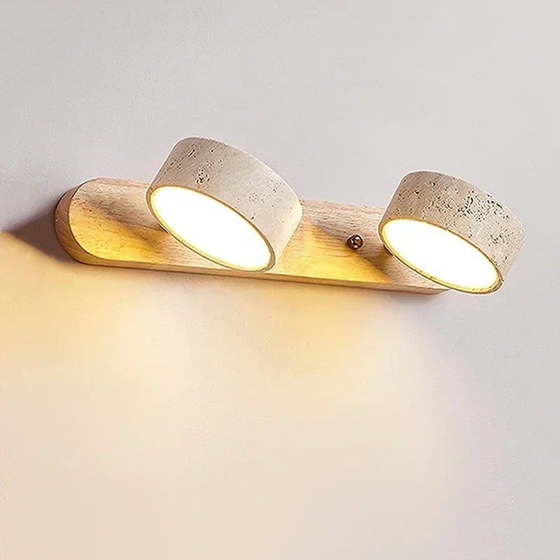 Modern LED wall lamp with rotating shades made of stone and a wooden base