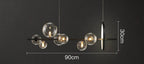 Modern Linear Chandelier – Glass Spheres and Light Ring on Black Frame
