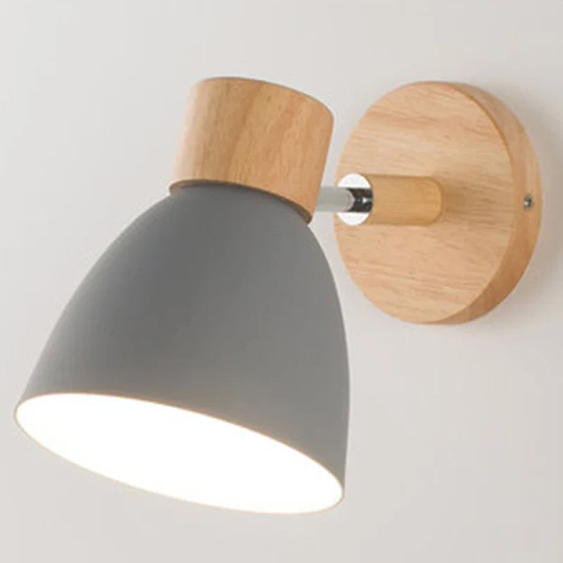Modern wall lamp with a wooden base and metal shade