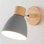 Modern wall lamp with a wooden base and metal shade