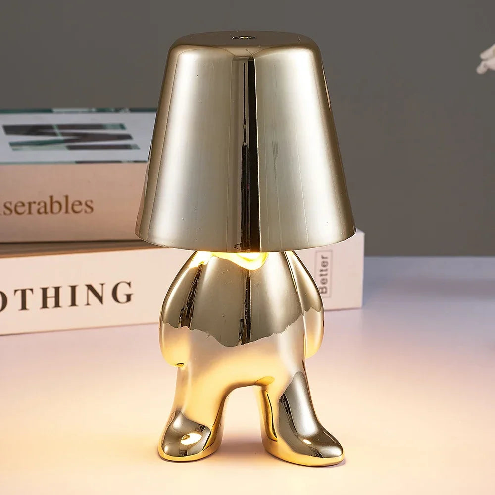 Designer LED Table Lamp Sitting Man with Glossy Finish