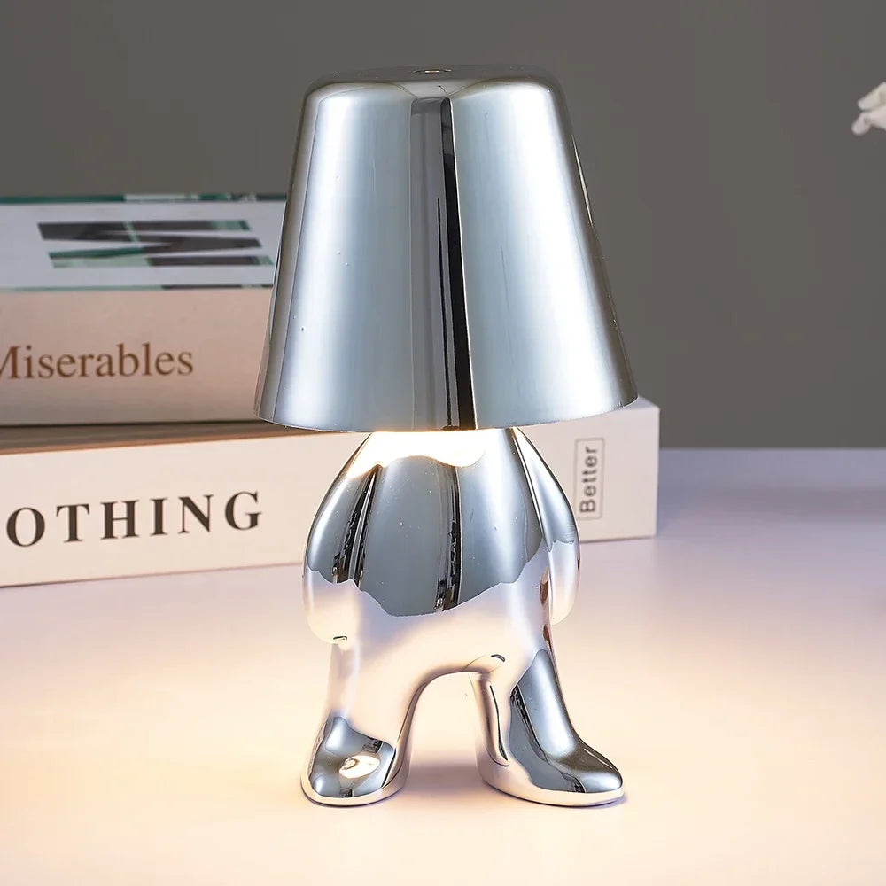 Designer LED Table Lamp Sitting Man with Glossy Finish