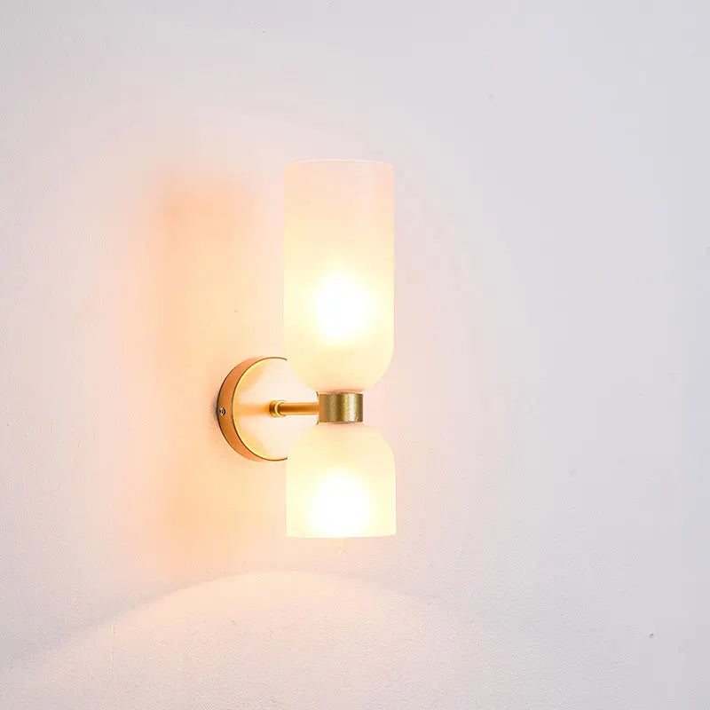 Elegant wall sconce with smoky glass and gold finish – double light source