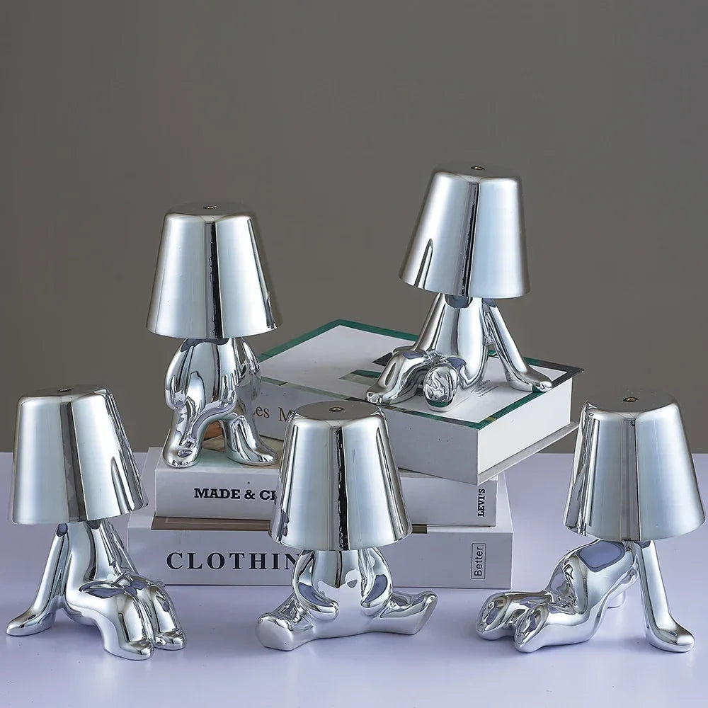 Designer LED Table Lamp Sitting Man with Glossy Finish