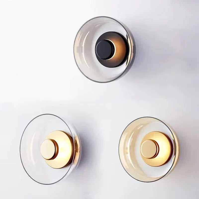 Modern wall lamp with a round shade
