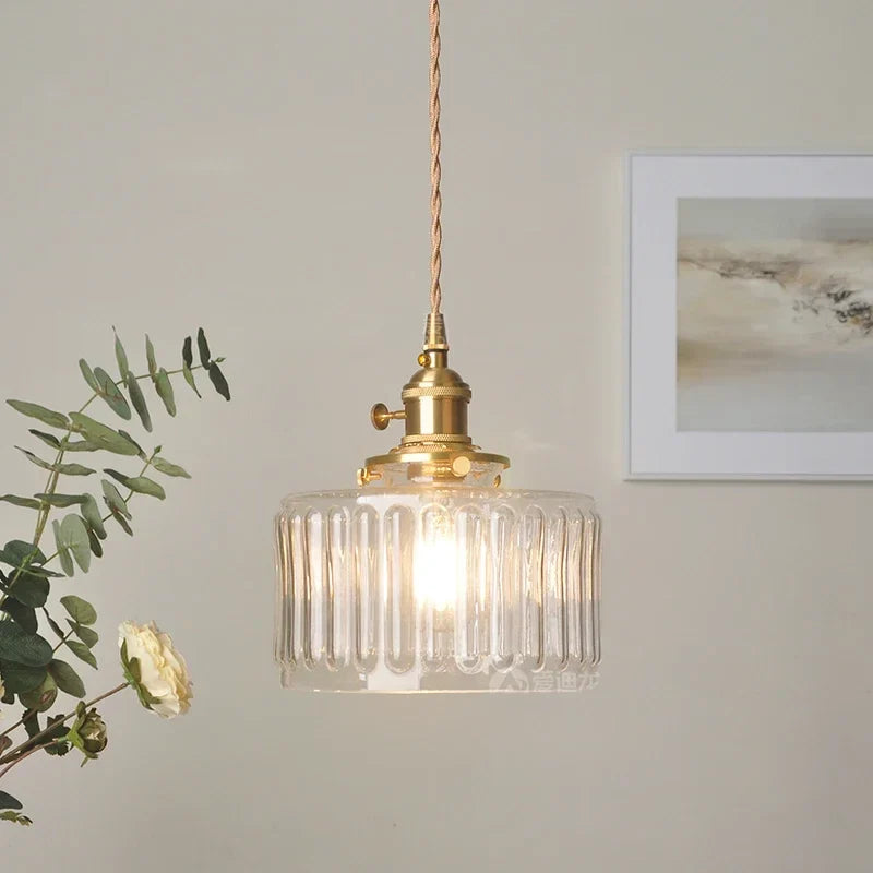 Vintage pendant lamp with ribbed glass shade and gold finish