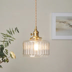 Vintage pendant lamp with ribbed glass shade and gold finish