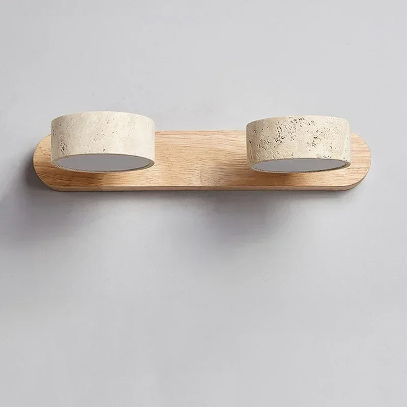 Modern LED wall lamp with rotating shades made of stone and a wooden base