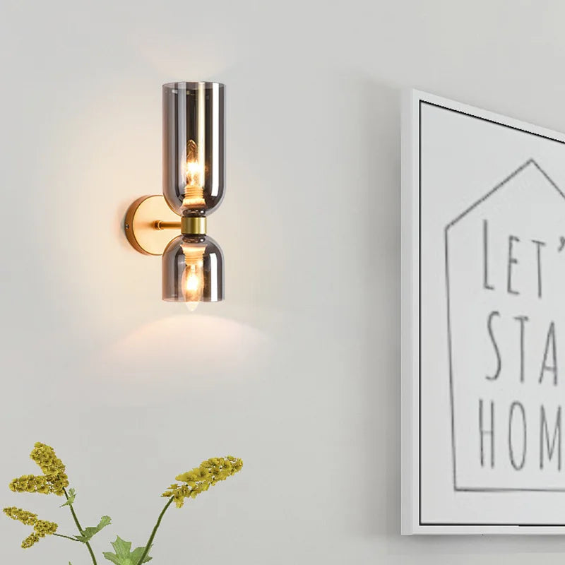 Elegant wall sconce with smoky glass and gold finish – double light source