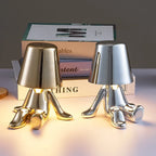 Designer LED Table Lamp Sitting Man with Glossy Finish