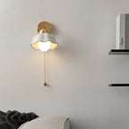 Wall lamp with wavy shade and chain