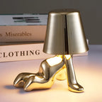 Designer LED Table Lamp Sitting Man with Glossy Finish