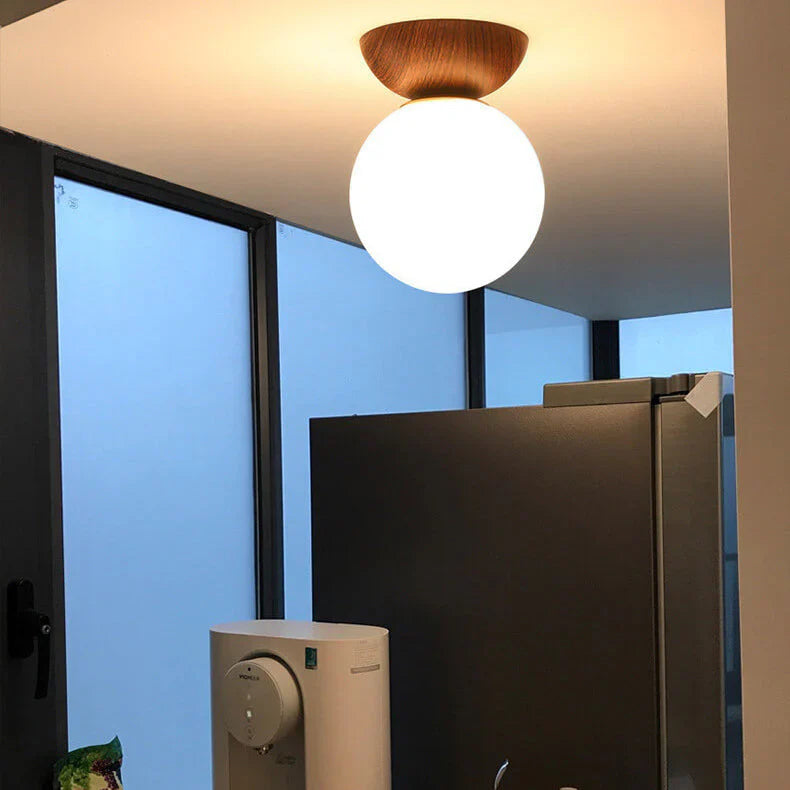 Modern ceiling lamp in Japanese style with a wooden base – minimalist sphere