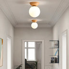 Modern ceiling lamp in Japanese style with a wooden base – minimalist sphere