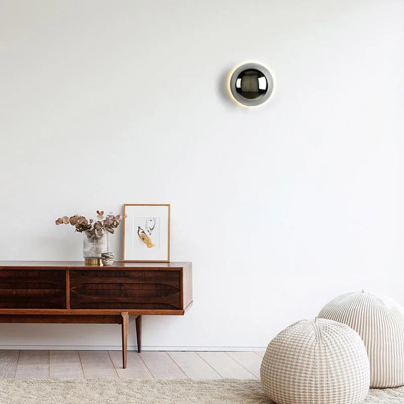 Modern LED wall sconce in the shape of a shimmering ball – wall lighting with a Bauhaus halo effect