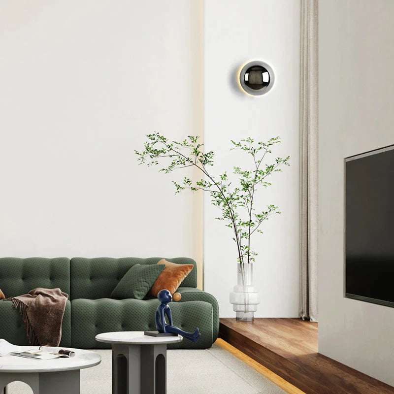 Modern LED wall sconce in the shape of a shimmering ball – wall lighting with a Bauhaus halo effect