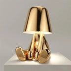 Designer LED Table Lamp Sitting Man with Glossy Finish