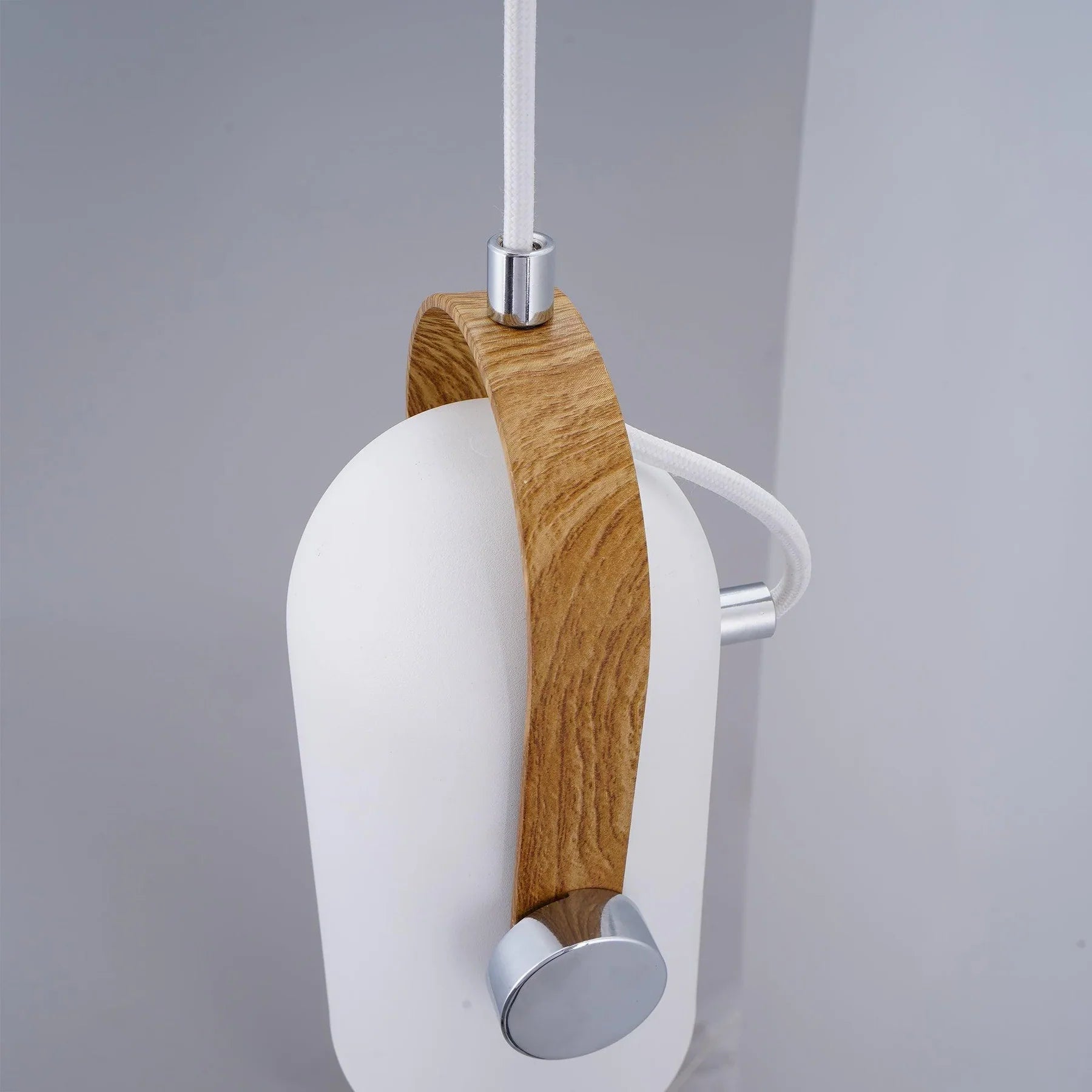 Modern pendant lamp with wooden accent and metal shade – loft style