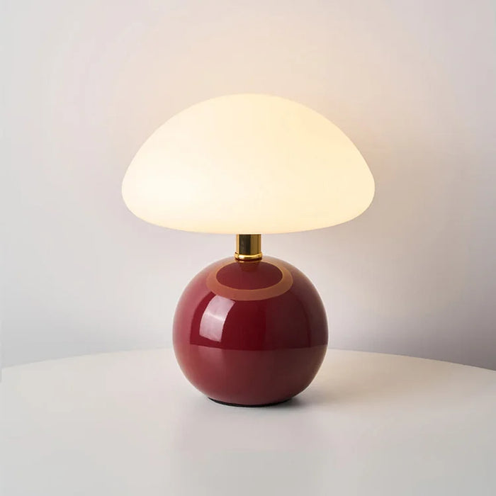 Modern table lamp with a spherical base and mushroom-shaped shade – minimalist style