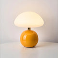 Modern table lamp with a spherical base and mushroom-shaped shade – minimalist style