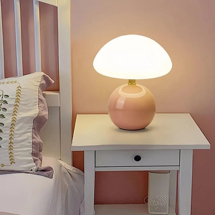 Modern table lamp with a spherical base and mushroom-shaped shade – minimalist style