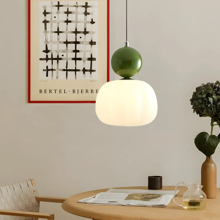 Modern pendant lamp with a spherical decorative element