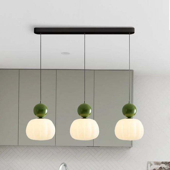 Modern pendant lamp with a spherical decorative element