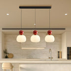 Modern pendant lamp with a spherical decorative element