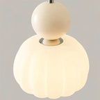 Modern pendant lamp with a spherical decorative element