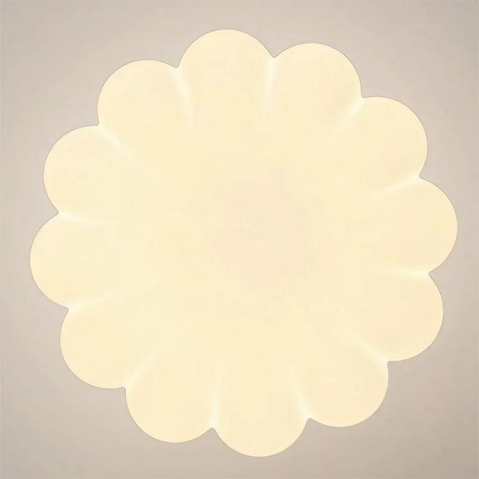 Modern pendant lamp with a spherical decorative element