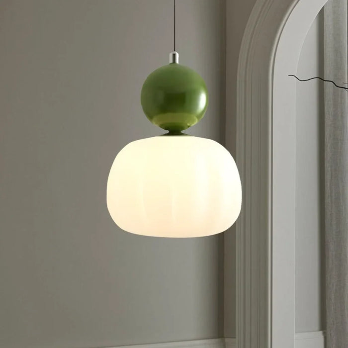 Modern pendant lamp with a spherical decorative element