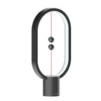 Modern LED lamp with magnetic switch – designer desk lamp with levitation effect