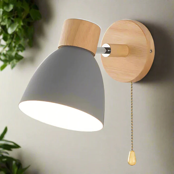 Modern wall lamp with a wooden base and metal shade